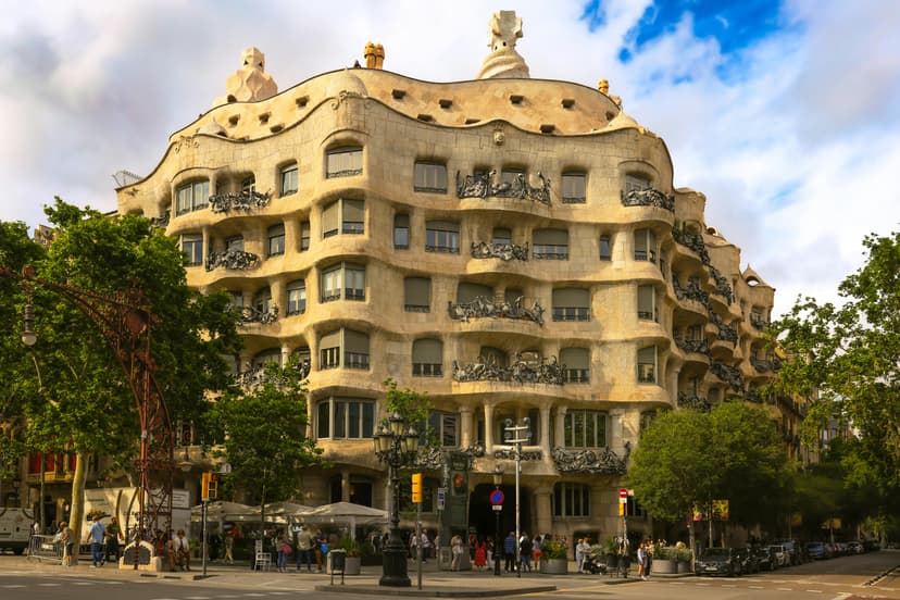 The flowing, quarry-like facade of Casa Milà, with its intricate wrought-iron balconies.